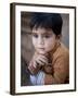 Boy Waits to Receive a Ration of Donated Rice at Food Distribution Center in Islamabad, Pakistan-null-Framed Photographic Print