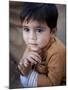 Boy Waits to Receive a Ration of Donated Rice at Food Distribution Center in Islamabad, Pakistan-null-Mounted Photographic Print