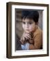 Boy Waits to Receive a Ration of Donated Rice at Food Distribution Center in Islamabad, Pakistan-null-Framed Photographic Print