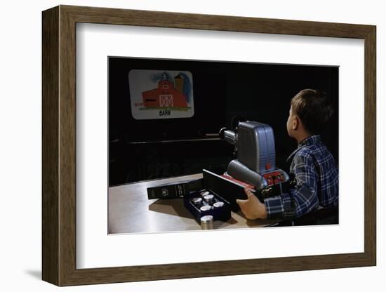 Boy Watching Film Strip-William P. Gottlieb-Framed Photographic Print