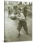 Boy with Football, Early 1900s-Marvin Boland-Stretched Canvas