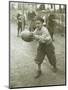 Boy with Football, Early 1900s-Marvin Boland-Mounted Giclee Print