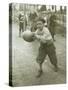 Boy with Football, Early 1900s-Marvin Boland-Stretched Canvas