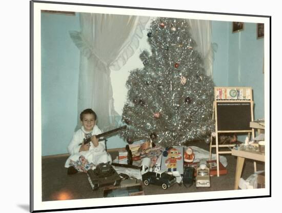 Boy with Gun and Fake Christmas Tree-null-Mounted Art Print