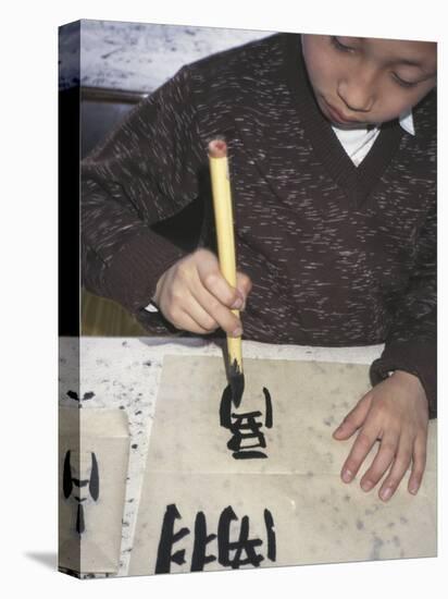 Boy Writing Chinese Calligraphy, Shanghai, China-Keren Su-Stretched Canvas