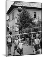 Boys and Girls Playing Volleyball-Lisa Larsen-Mounted Photographic Print