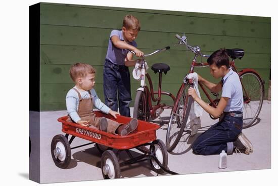 Boys Cleaning their Bikes-William P. Gottlieb-Stretched Canvas