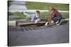 Boys Looking into Grate-William P. Gottlieb-Stretched Canvas