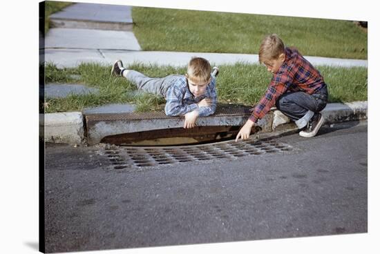 Boys Looking into Grate-William P. Gottlieb-Stretched Canvas