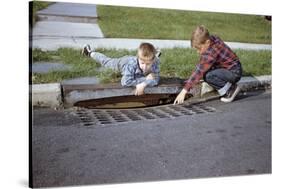 Boys Looking into Grate-William P. Gottlieb-Stretched Canvas