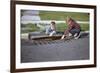 Boys Looking into Grate-William P. Gottlieb-Framed Photographic Print