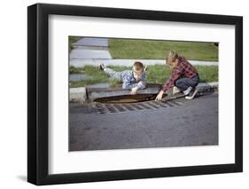 Boys Looking into Grate-William P. Gottlieb-Framed Photographic Print