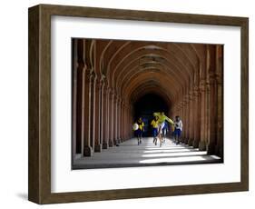 Boys Play Soccer Through an Arched Hallway at the Allahabad University Campus-null-Framed Photographic Print