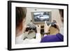 Boys Playing a Video Game-Johnny Greig-Framed Premium Photographic Print