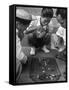 Boys Playing Board Game on Sidewalk in Front of the Trocadero Hotel-Dmitri Kessel-Framed Stretched Canvas