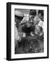 Boys Playing Board Game on Sidewalk in Front of the Trocadero Hotel-Dmitri Kessel-Framed Photographic Print