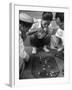 Boys Playing Board Game on Sidewalk in Front of the Trocadero Hotel-Dmitri Kessel-Framed Photographic Print