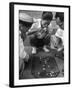 Boys Playing Board Game on Sidewalk in Front of the Trocadero Hotel-Dmitri Kessel-Framed Photographic Print