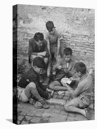 Boys Playing Cards on Steps in Town-Dmitri Kessel-Stretched Canvas