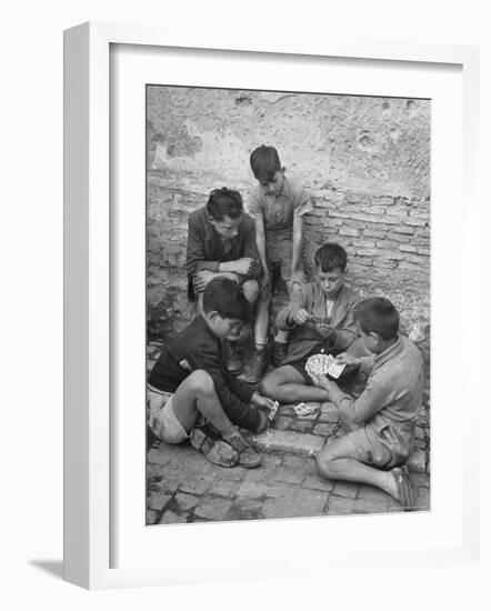 Boys Playing Cards on Steps in Town-Dmitri Kessel-Framed Photographic Print