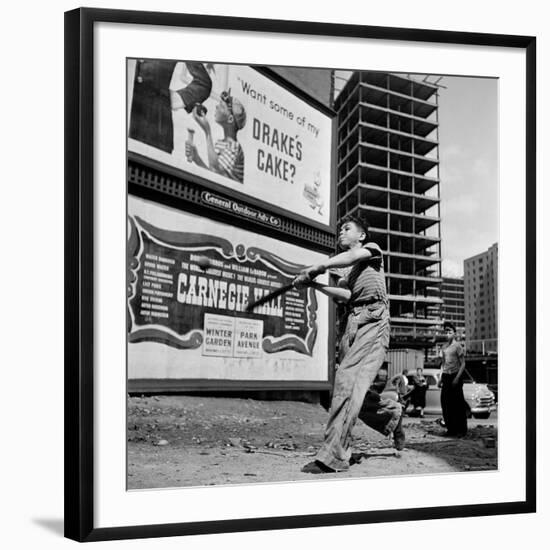 Boys Playing Stickball in Vacant Lot Next to Drake's Cake and Movie "Carnegie Hall"-Ralph Morse-Framed Photographic Print