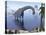 Brachiosaurus Dinosaur Walking in Water by Morning Light-null-Stretched Canvas