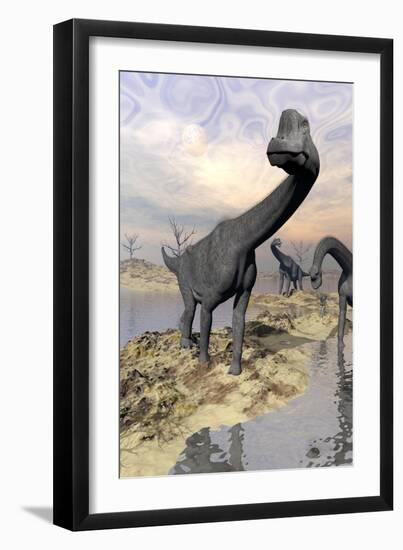 Brachiosaurus Dinosaurs Near Water with Reflection by Sunset and Full Moon-null-Framed Art Print