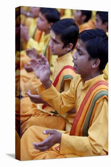 Brahmachari singing in Parmath, Rishikesh, Uttarakhand, India-Godong-Stretched Canvas