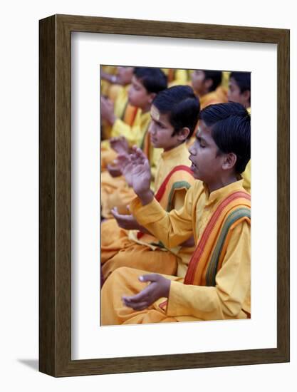 Brahmachari singing in Parmath, Rishikesh, Uttarakhand, India-Godong-Framed Photographic Print