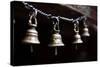 Brass Bells Hang at the Entryway to a Temple in Kathmandu, Nepal-Sergio Ballivian-Stretched Canvas
