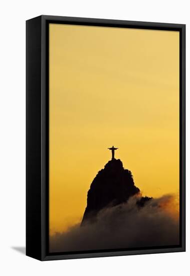 Brazil, City of Rio de Janeiro, Sunset view of the Christ the Redeemer and Corcovado Mountain.-Karol Kozlowski-Framed Stretched Canvas