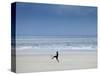 Brazil, Maranhao, Sao Luis, Sao Marcos Beach, Boy Playing Football on the Beach-Alex Robinson-Stretched Canvas