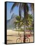 Brazil, Rio De Janeiro, Leblon Beach, Bike Leaning on Palm Tree-Jane Sweeney-Framed Stretched Canvas