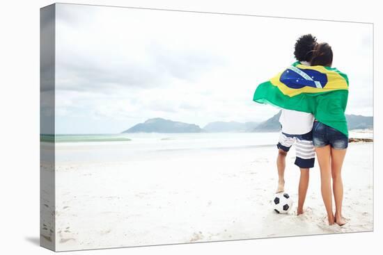 Brazil Soccer Fans Stand on Beach Together with Flag for World Cup with Ball-warrengoldswain-Stretched Canvas