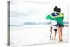 Brazil Soccer Fans Stand on Beach Together with Flag for World Cup with Ball-warrengoldswain-Stretched Canvas