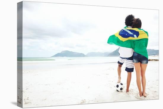 Brazil Soccer Fans Stand on Beach Together with Flag for World Cup with Ball-warrengoldswain-Stretched Canvas