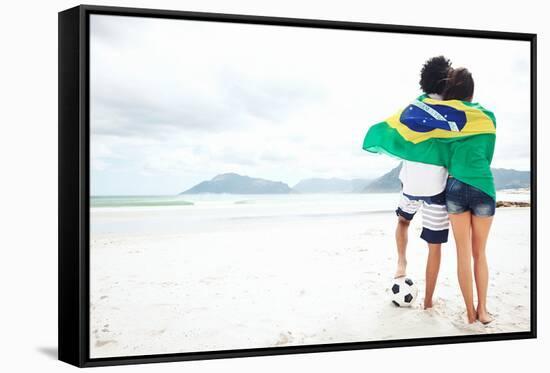 Brazil Soccer Fans Stand on Beach Together with Flag for World Cup with Ball-warrengoldswain-Framed Stretched Canvas