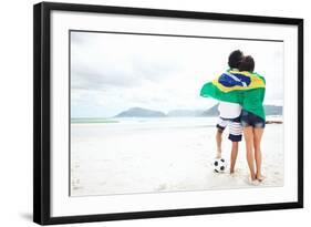 Brazil Soccer Fans Stand on Beach Together with Flag for World Cup with Ball-warrengoldswain-Framed Photographic Print