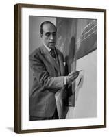 Brazilian Architect Oscar Niemeyer Discussing Design for the United Nations Headquarters Buildings-null-Framed Premium Photographic Print