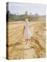 Brazilian Woman Walking Down a Sandy Road Carrying a Large Jar on Her Head-Dmitri Kessel-Stretched Canvas
