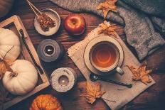 Autumn Mood Concept. Warm, Cozy and Rustic Still Life with Cup of Tea, Candle and Pumpkins.-brebca-Photographic Print