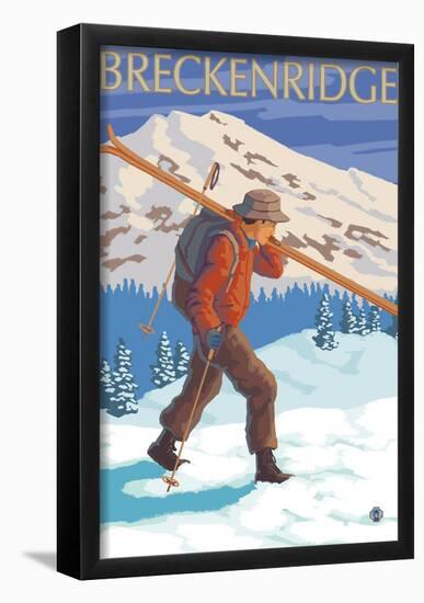 Breckenridge, Colorado, Skier Carrying Skis-null-Framed Poster