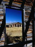 Hut Framed by Window of Burnt Log Cabin, Wind River Country, Lander, USA-Brent Winebrenner-Stretched Canvas