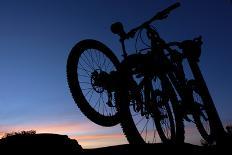 A Silhouette of Two Mountain Bikes on Car Rack in Red Rock Canyon in Nevada-Brett Holman-Photographic Print