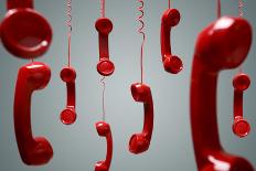 Red Telephone Receiver Hanging-Brian Jackson-Photographic Print