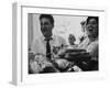 Bride and Groom Breaking Bread During Wedding-Paul Schutzer-Framed Photographic Print