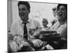 Bride and Groom Breaking Bread During Wedding-Paul Schutzer-Mounted Photographic Print