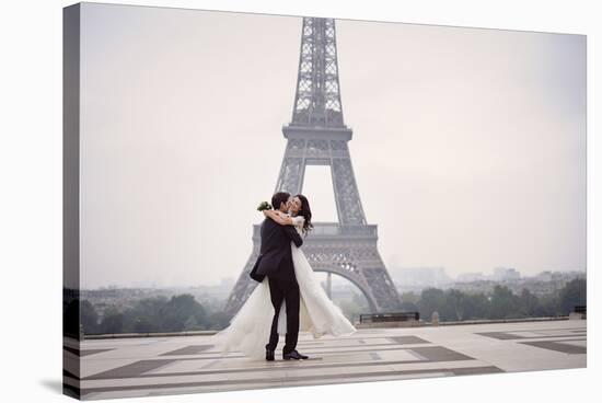 Bride & Groom at Eiffel Tower-null-Stretched Canvas