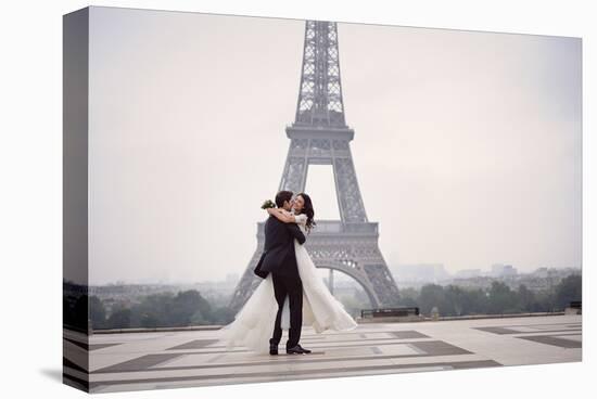 Bride & Groom at Eiffel Tower-null-Stretched Canvas