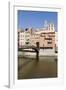 Bridge and Brightly Painted Houses on the Bank of the Riu Onyar-Martin Child-Framed Photographic Print